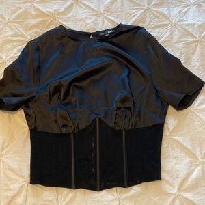 Black, satin, crop top with corset detailing and open back.